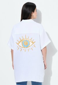 Длинная блузка Длинная блузка