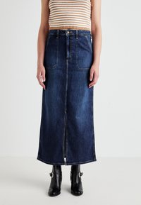 Юбка с накладными карманами Юбка с накладными карманами