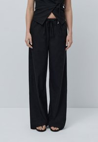 Широкие брюки Широкие брюки