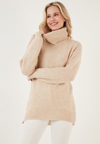 Длинный пуловер Длинный пуловер