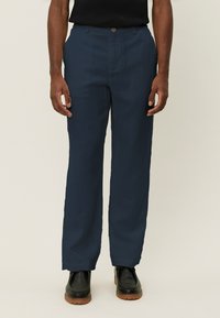 Льняные брюки Льняные брюки