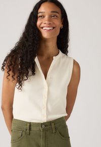 Джинсовая жилетка Джинсовая жилетка