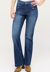 Клешеные брюки Клешеные брюки