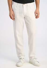 Льняные брюки Льняные брюки