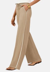 Широкие брюки Широкие брюки