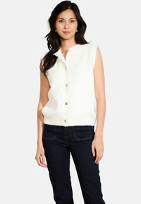 Вязаный жилет Вязаный жилет