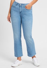 Клешеные джинсы Клешеные джинсы