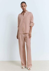 Длинная блузка Длинная блузка