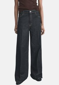 Свободные джинсы Свободные джинсы