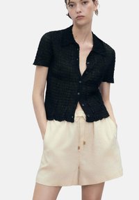 Шорты Шорты