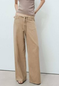 Широкие брюки Широкие брюки