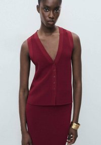 Жилет Жилет