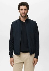 Жилет Жилет