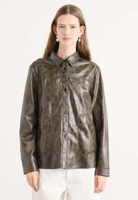 Кожаная куртка Кожаная куртка