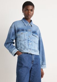 Джинсовая куртка Джинсовая куртка