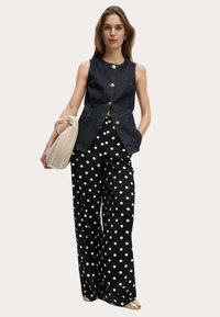 Джинсовая жилетка Джинсовая жилетка