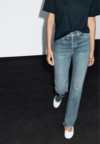 Клешеные брюки Клешеные брюки