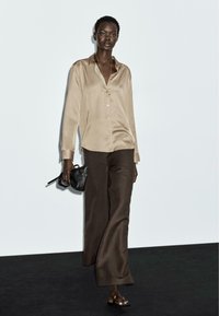 Атласная блузка Атласная блузка