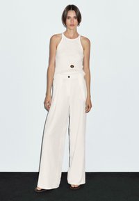 Широкие брюки Широкие брюки