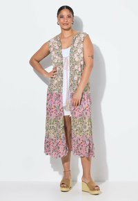 Вязаный жилет Вязаный жилет