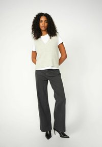 Клешеные джинсы Клешеные джинсы