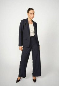 Широкие брюки Широкие брюки