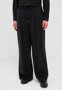 Широкие брюки Широкие брюки