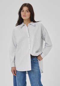 Длинная блузка Длинная блузка