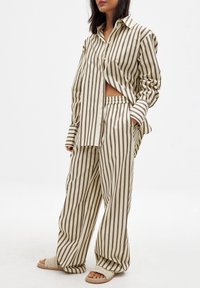 Широкие брюки Широкие брюки