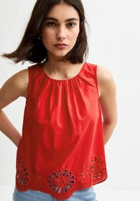 Блузка без рукавов Блузка без рукавов