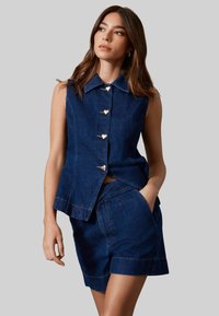 Джинсовые шорты Джинсовые шорты