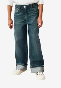 Джинсы Джинсы