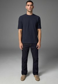 Клешеные джинсы Клешеные джинсы