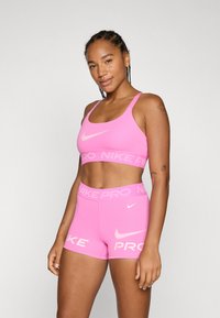 Спортивный бюстгальтер Спортивный бюстгальтер