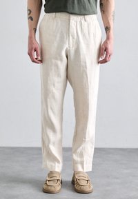 Льняные брюки Льняные брюки