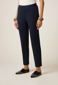 Узкие брюки Узкие брюки