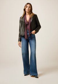 Кожаная куртка Кожаная куртка