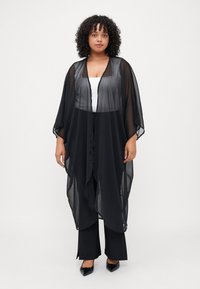 Длинная куртка Длинная куртка