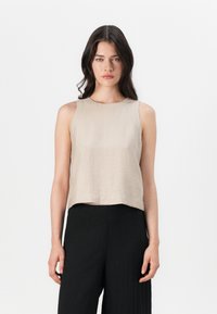 Блузка без рукавов Блузка без рукавов