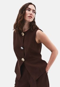 Джинсовая жилетка Джинсовая жилетка