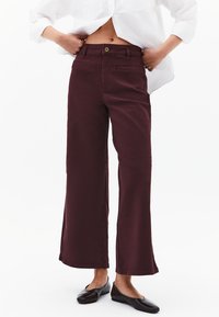 Клешеные джинсы Клешеные джинсы