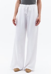 Широкие брюки Широкие брюки