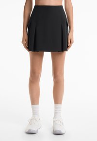 Юбка с накладными карманами Юбка с накладными карманами