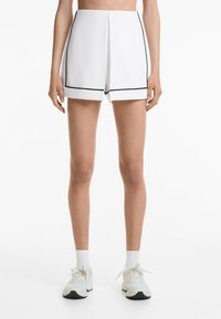 Мини-юбка Мини-юбка