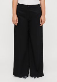 Широкие брюки Широкие брюки