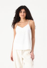 Топ на бретельках Топ на бретельках