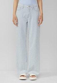 Клешеные джинсы Клешеные джинсы