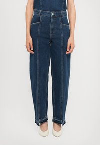 Джинсы бойфренда Джинсы бойфренда