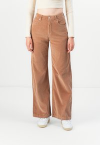 Широкие брюки Широкие брюки