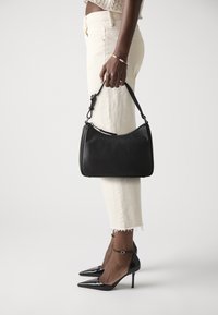 Кожаная сумка Кожаная сумка